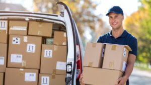 Delivery driver with packages using van from Houston commercial vehicle leasing 