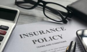 close up of auto insurance policy for commercial vehicle leasing